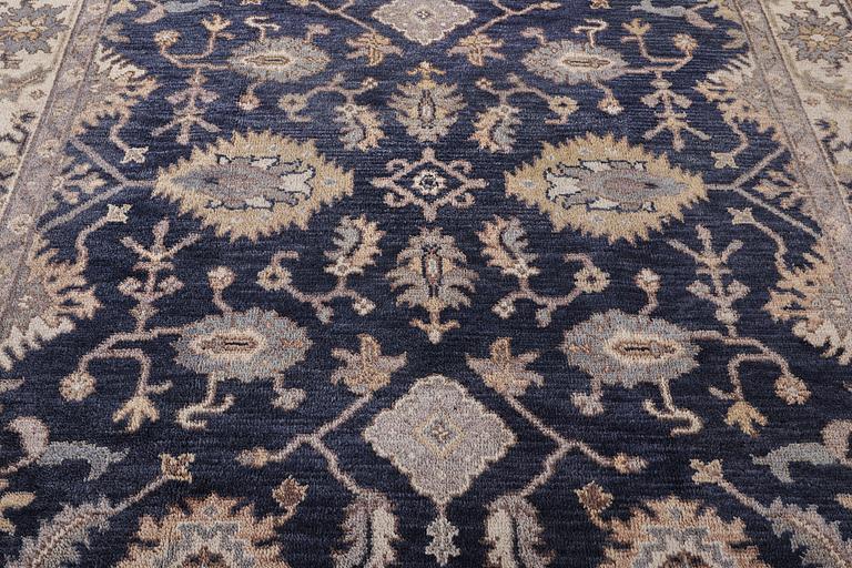 An oriental carpet of Mamluk design, c. 300 x 245 cm.