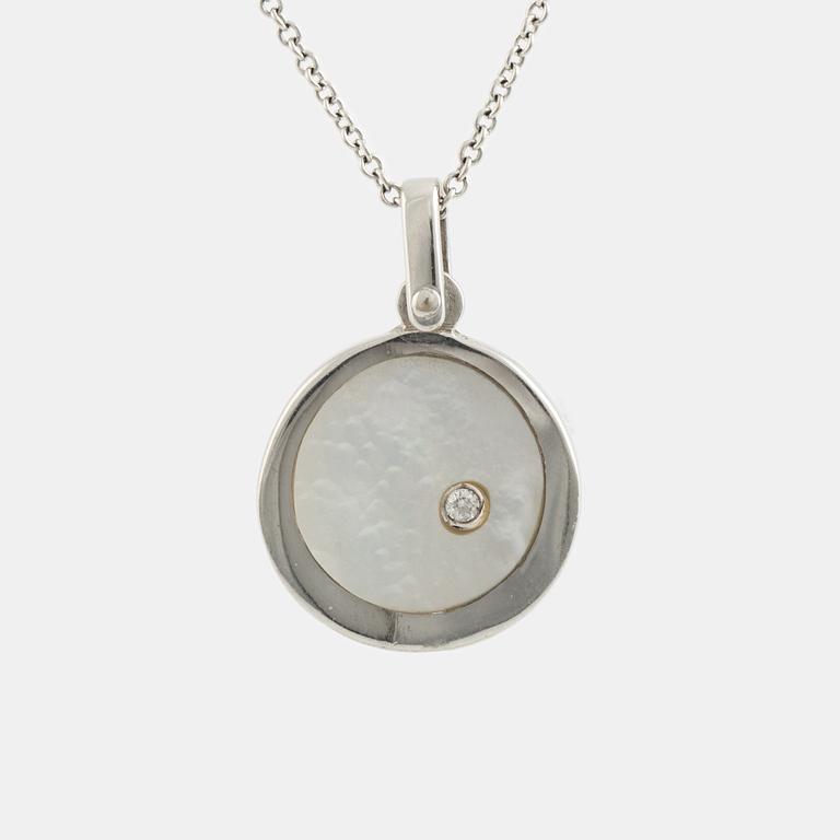 White gold, mother of pearl and round brilliant cut diamond necklace.