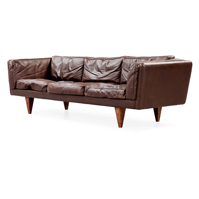 An Illum Wikkelsø three seated brown leather sofa, Michael Laursen, Denmark 1960's.