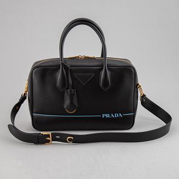 PRADA, a leather bag.