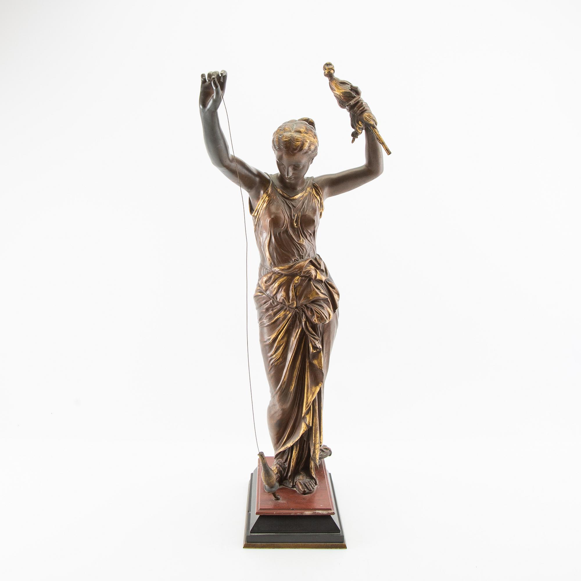 Okänd konstnär 1900-tal, skulptur Kvinna med slända.