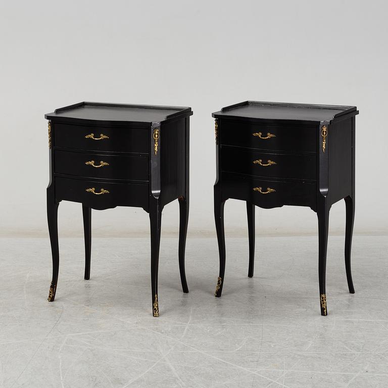 A second half of the 20th Century rococo style pair of bedside drawers.