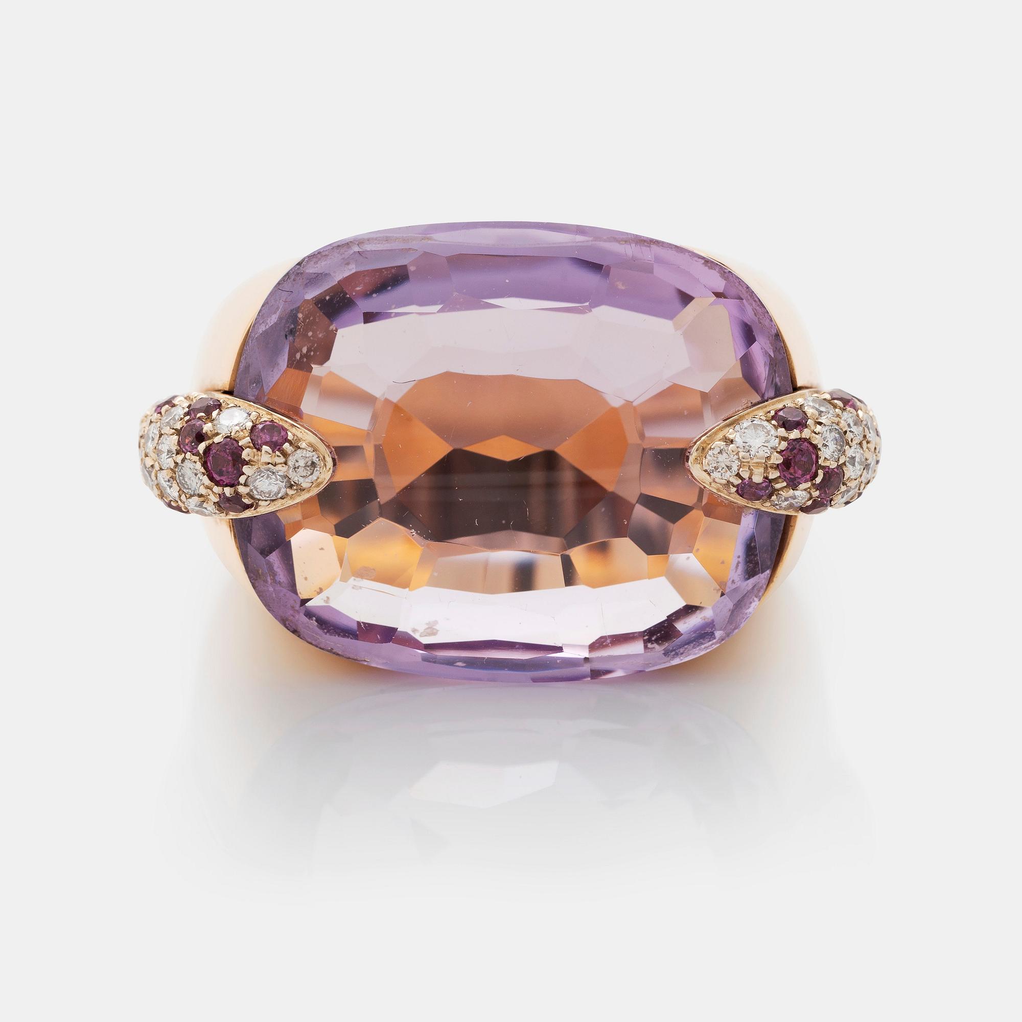 A Pomellato ring set with amethysts and round brilliant-cut diamonds.