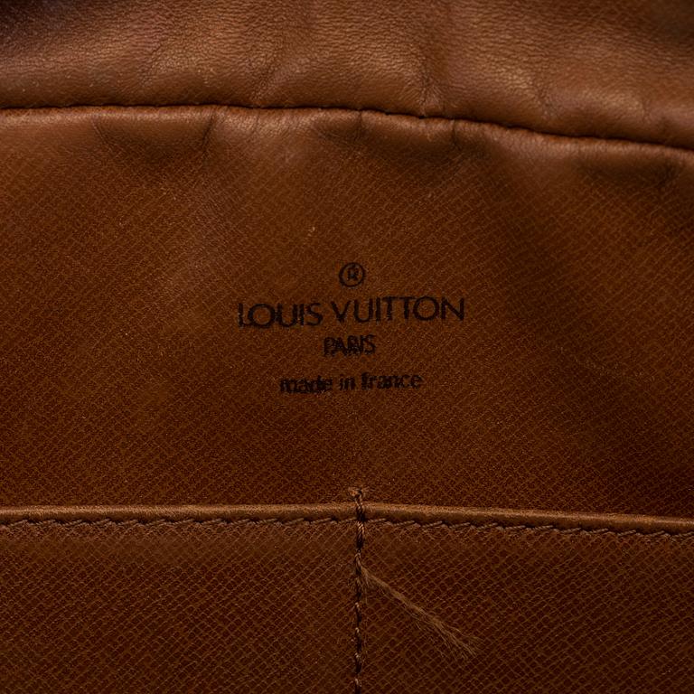 A bag by Louis Vuitton.
