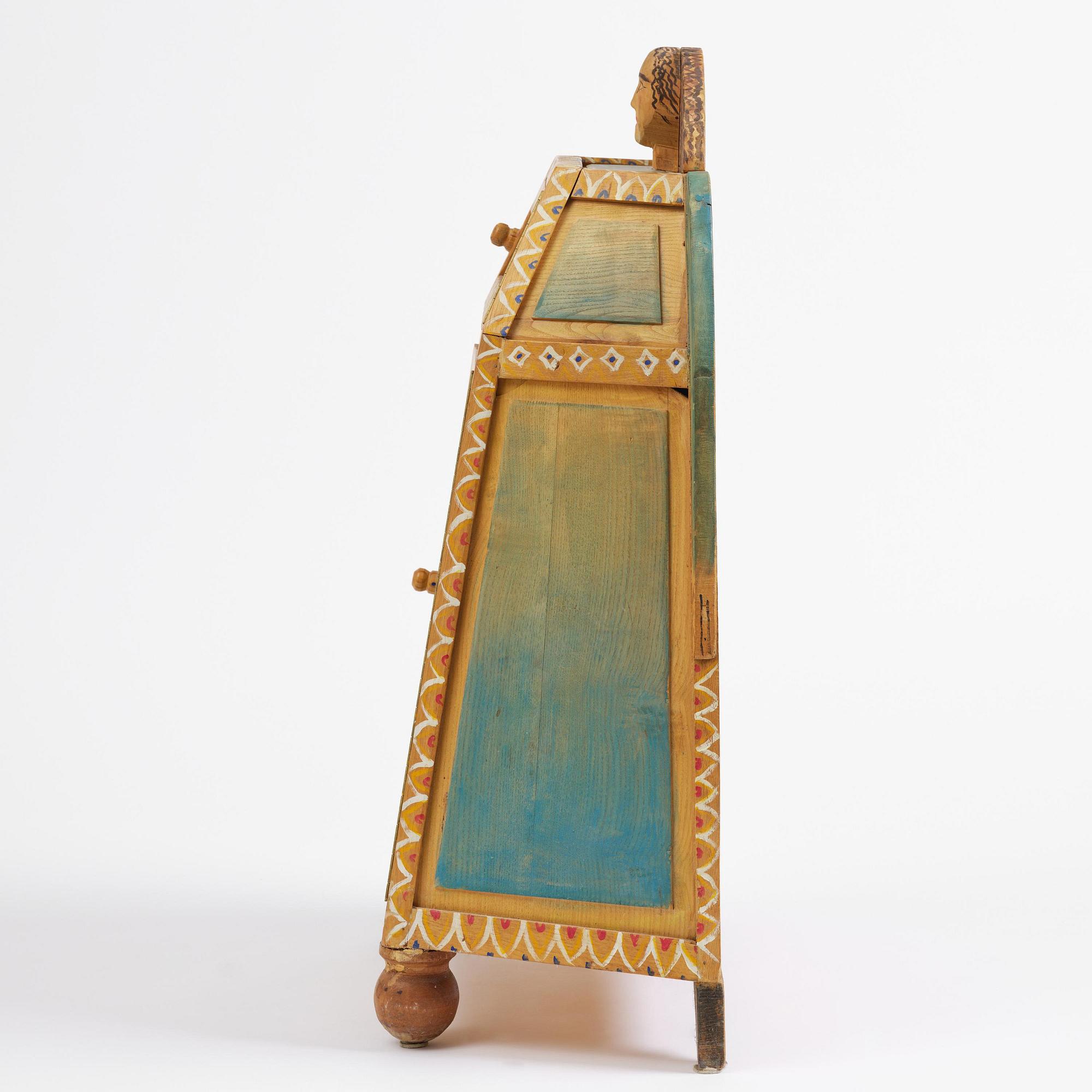 Gérard Rigot, a painted and carved oak cabinet, exectued in his studio, France, second half of the 20th century.