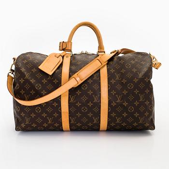 Louis Vuitton, a Monogram Canvas 'Keepall 55 Bandouliere' bag.