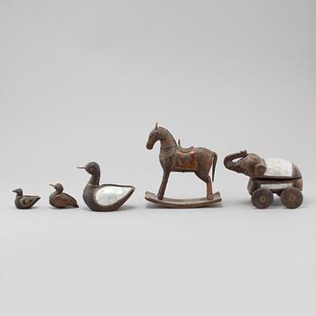 Five wooden toys from the latter half of the 20th century.