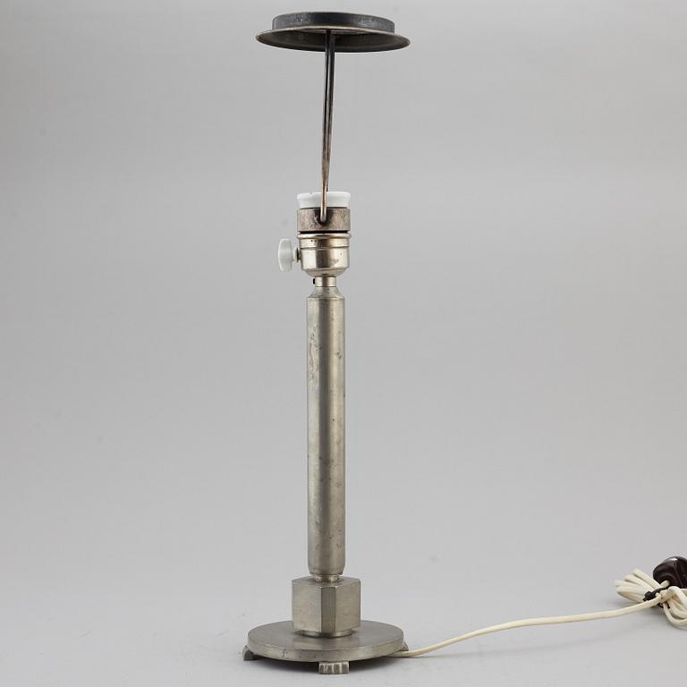 A 1920's Swedish Grace table lamp by GAB.