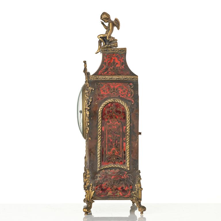 A Rococo-style mantle clock, around 1900.