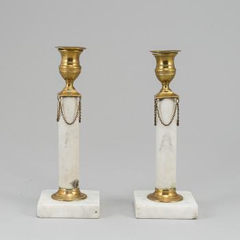 A pair of late gustavian  candlesticks, ca 1800.