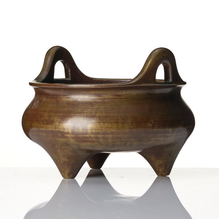 A large bronze tripod censer, Qing dynasty with Xuande six character mark.