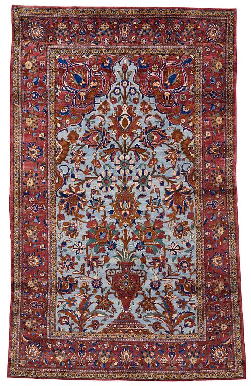 A RUG, a semi-antique silk Kashan, ca 201,5 x 122-130 cm.