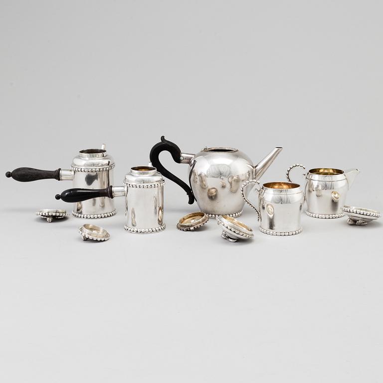 An 18th century parcel-gilt silver 5 piece tea-set, marked FI.