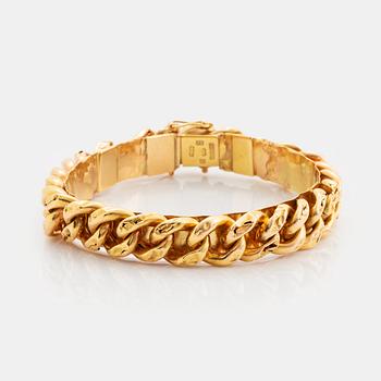 432. An 18K gold bracelet.