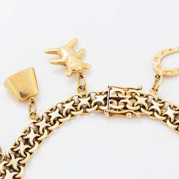 18K gold bracelet with charms.