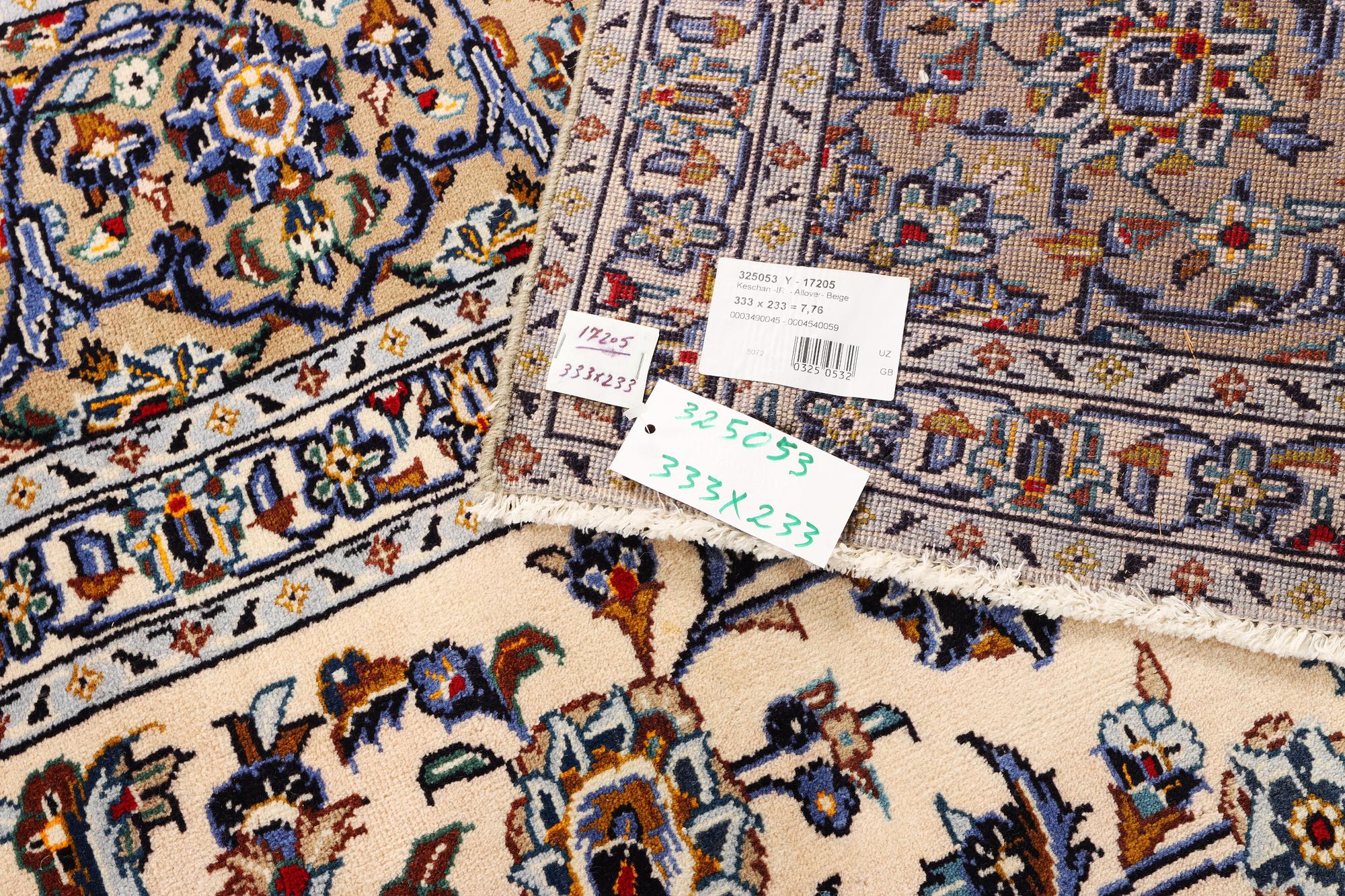 A Keshan carpet, c. 333 x 233 cm.