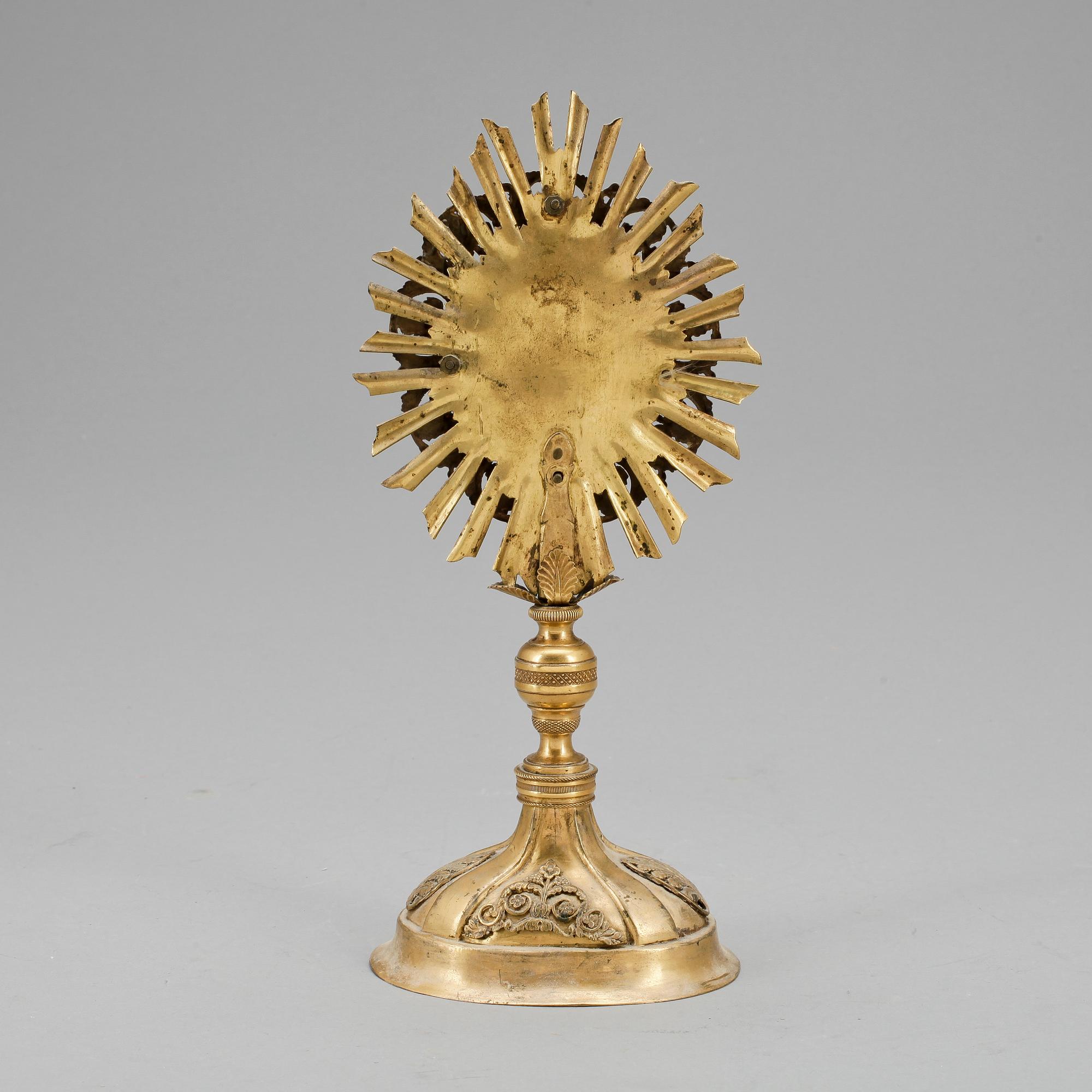 MONSTRANS förgylld mässing, empire, 1800-talets första hälft.