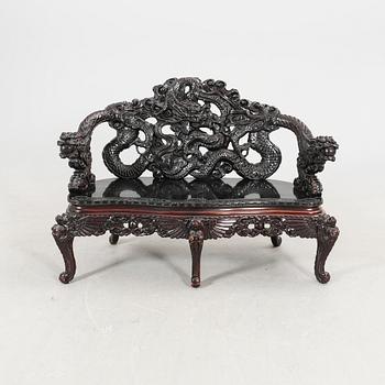 A Chinese wooden sofa 20th century.