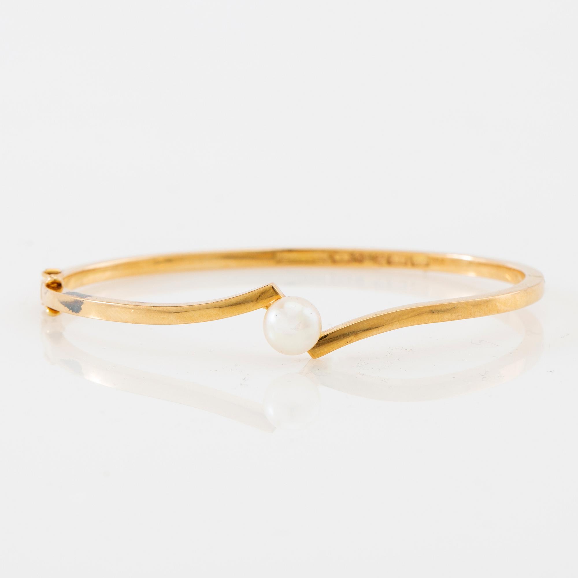Armring, 18K guld och pärla, Stigbert, Stockholm, 1964.