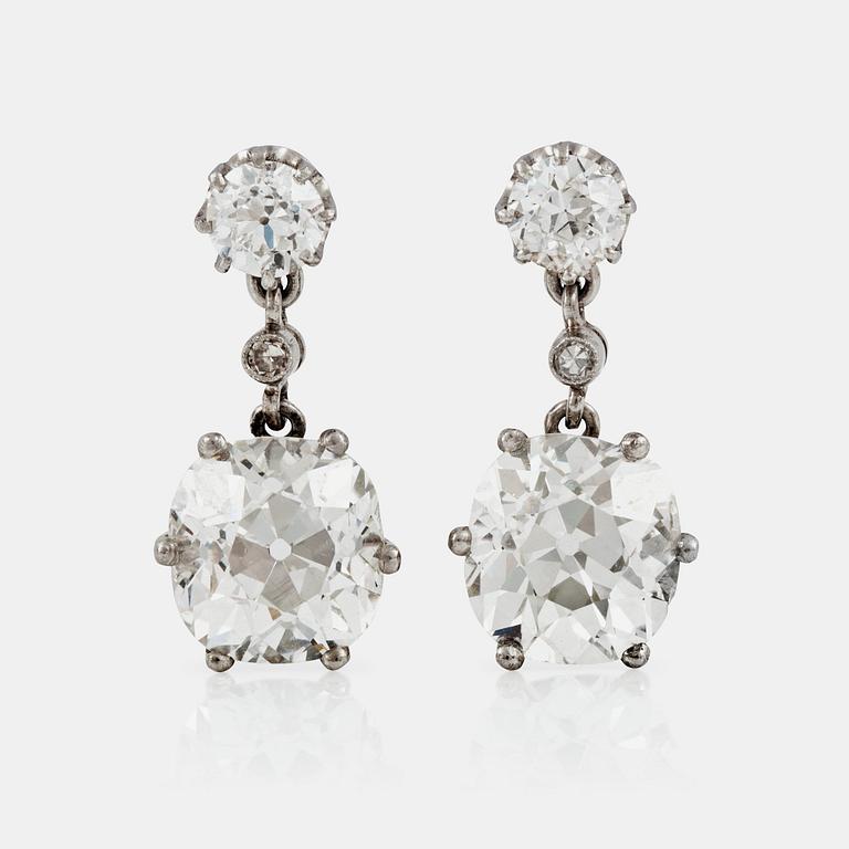 A pair of cushion-cut diamond earrings. Total carat weight of diamonds circa 7.80 cts.