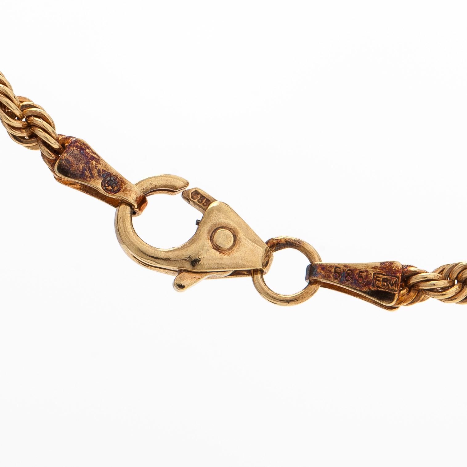 Kalevala Koru, a pendant/brooch with chain, "Lily", 14K gold and spectrolite. Helsinki 2002.