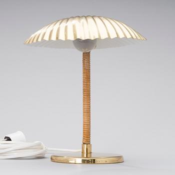 PAAVO TYNELL, A DESK LAMP. Shell. Manufactured by Taito Oy. Designed in 1938/39.