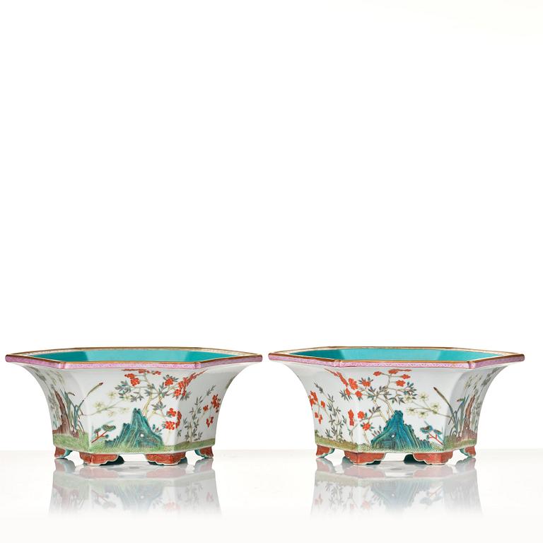 A pair of famille rose flower pots with stands, probably Republic, China, 20th Century.