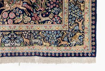 A semi-antique Kirman carpet, south eastern Iran, c. 278 x 188 cm.