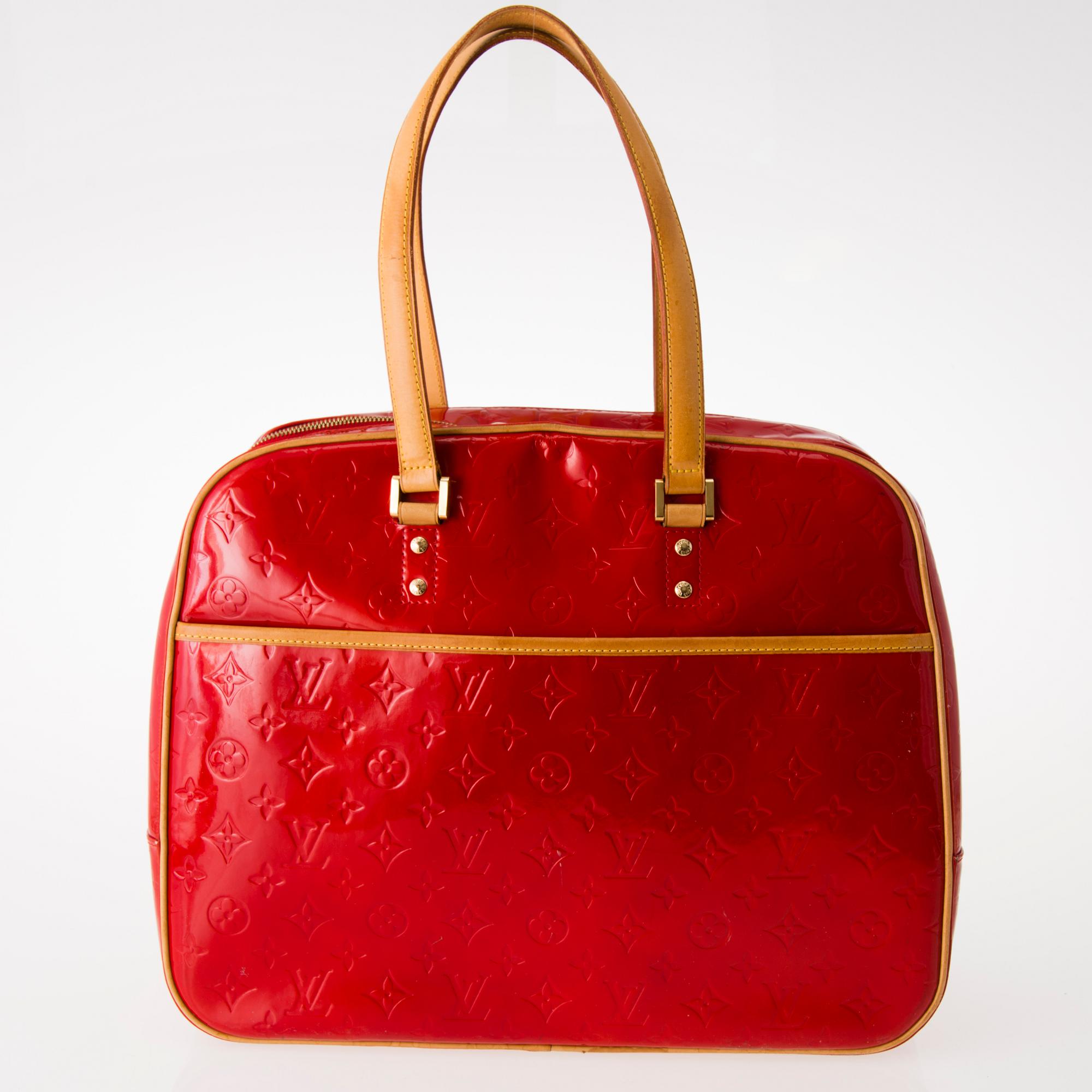 LOUIS VUITTON, "Sutton", VÄSKA.
