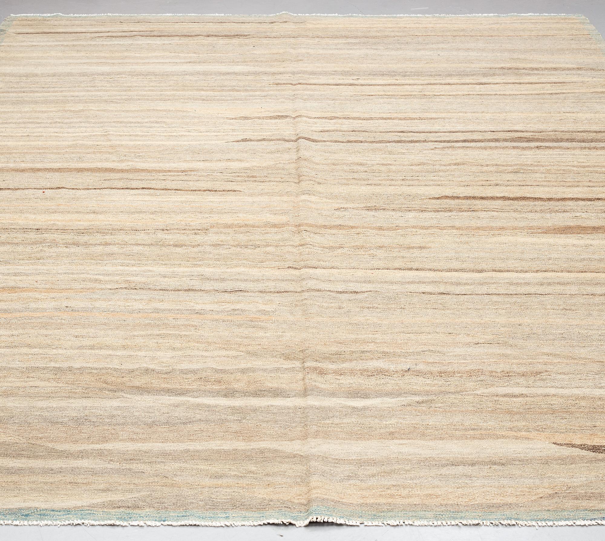 A CARPET, kilim, ca 422 x 299 cm.