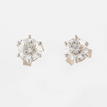 A pair of earrings in 18K white gold with round brilliant-cut diamonds.