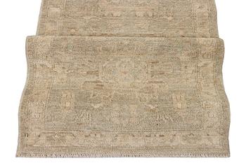 An Ushak runnercarpet, c. 295 x 87 cm.