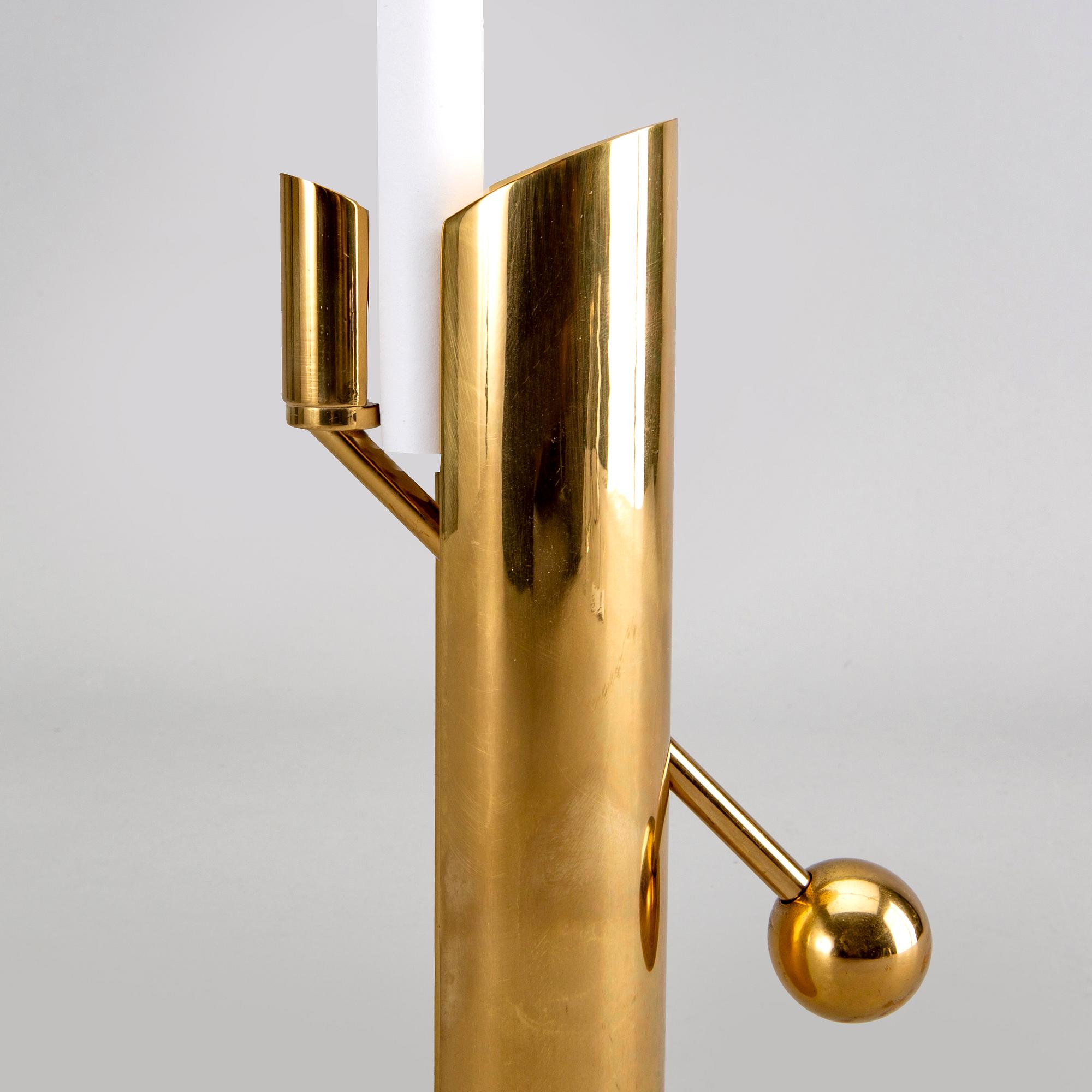 A Pierre Forssell brass candle stick for Skultuna.