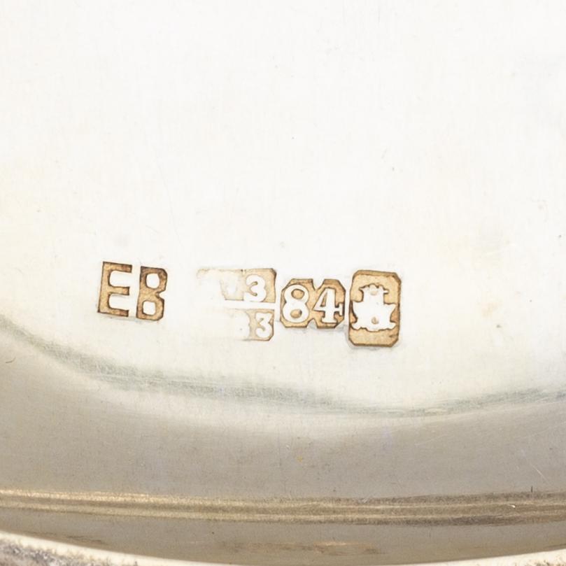 A Russian silver cigarette-case, marked EB, 1883.