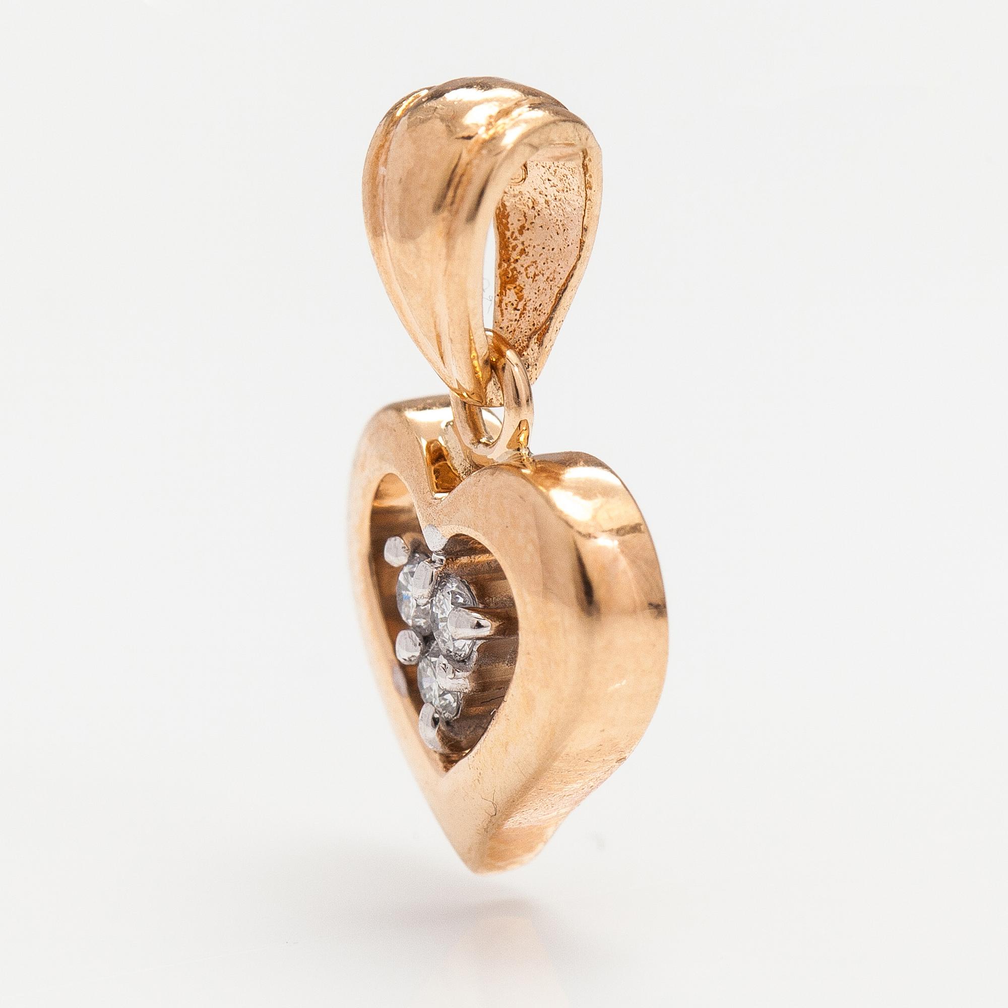 Hänge, 14K guld, diamanter ca 0.045 ct tot. Einari Ailio, Jyväskylä.