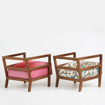 Axel Einar Hjorth, a pair of stained pine lounge chairs "Sport", Nordiska Kompaniet, Sweden 1930's.