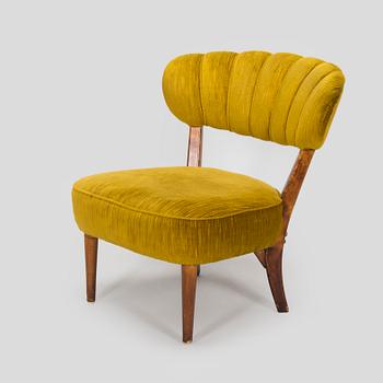 Lisa Johansson-Pape, a 1940s armchair for Oy Stockmann Ab, Keravan puusepäntehdas.
