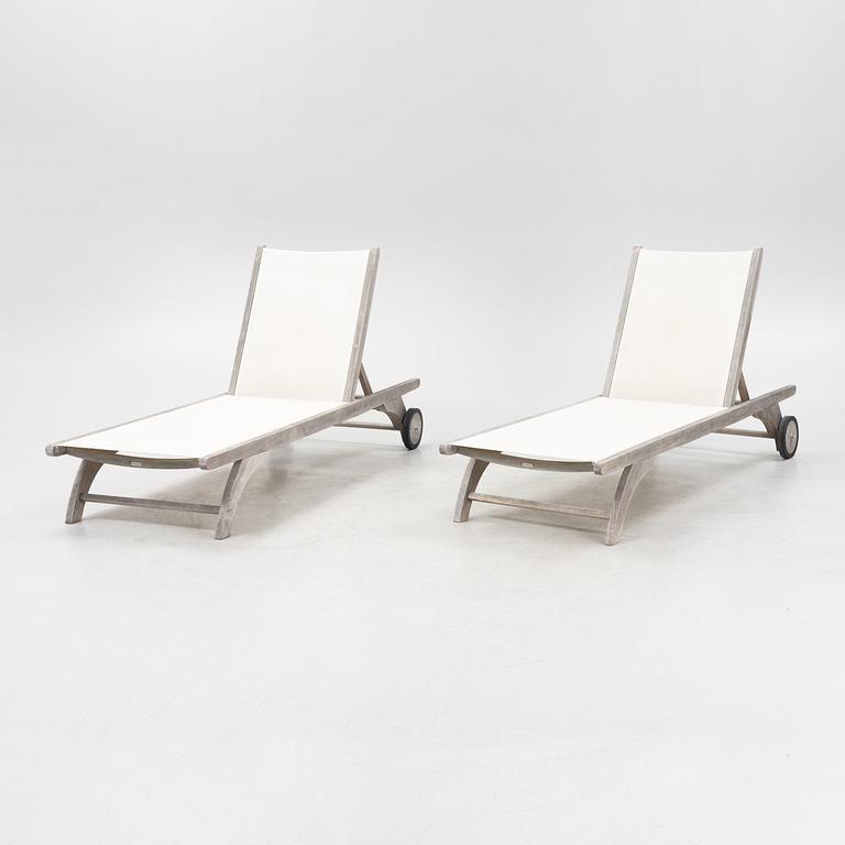 A pair of 'Columbus Sunbed' teak deck chairs, Skagerak, Denmark.