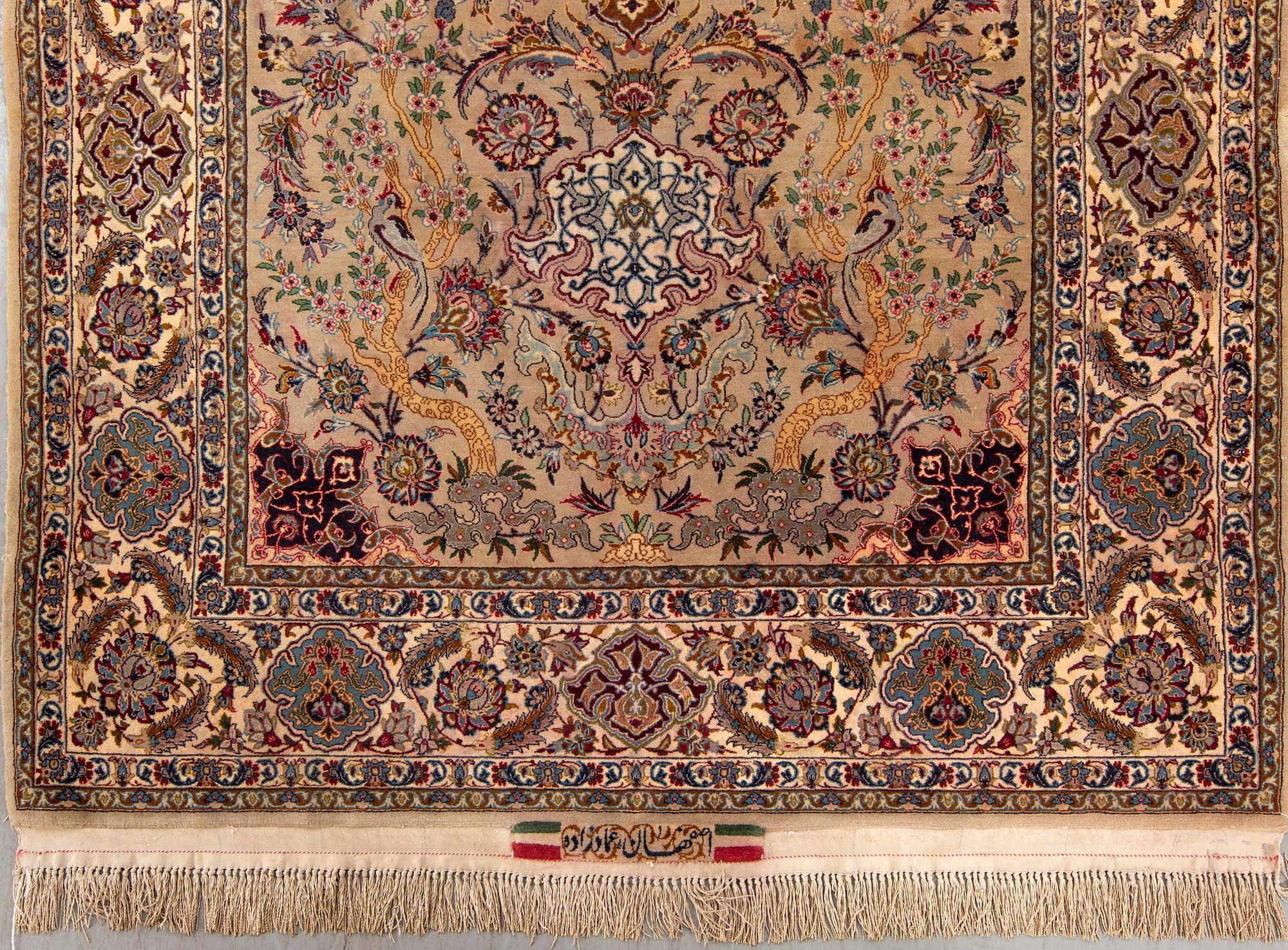 A signed isfahan part silk carpet ca 192 x 118 cm.