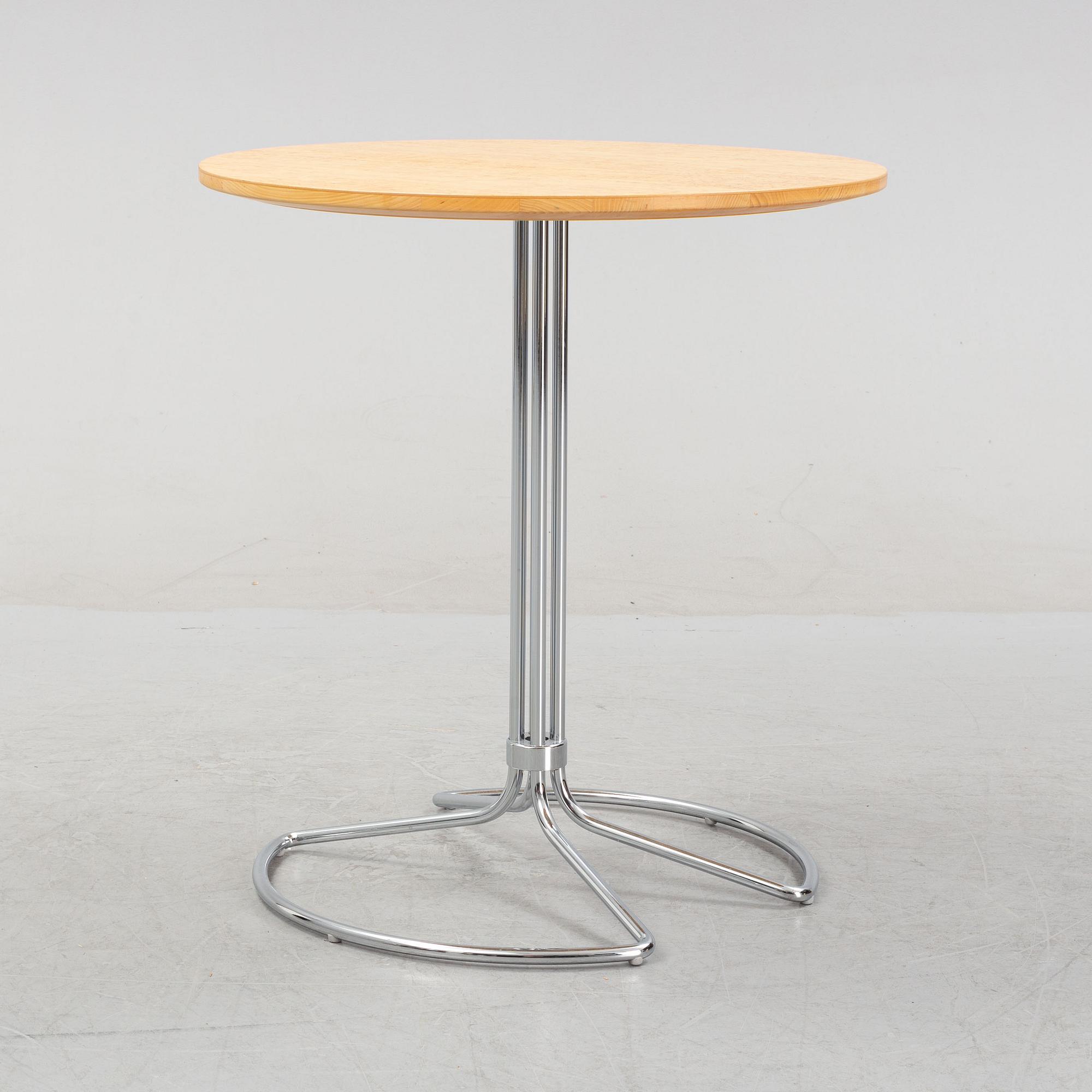 Bruno Mathsson, a steel and birch burl side table from Bruno Mathsson International.