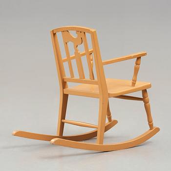 Carl Hörvik, A Carl Hörvik children's rocking chair, Nordiska Kompaniet, the model exhibited in Gothenburg 1923.