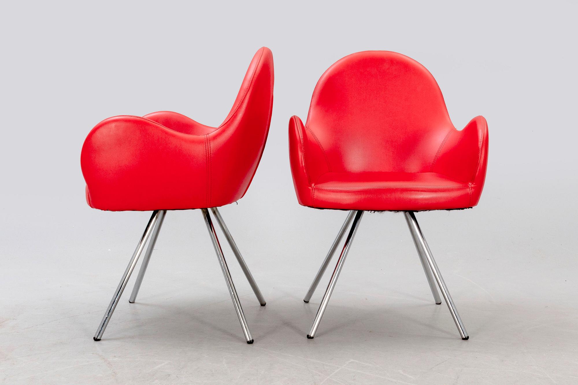 A pair of MB Sedie leather armchairs later part of the 20th century.