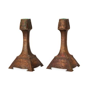 A pair of G Backlund & Hugo Elmqvist Art Nouveau patinated bronze candlesticks, AB Hugo Emlqvist, Stockholm.