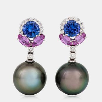 594. A pair of earrings with cultured Tahiti pearls, tanzanites, sapphires and diamonds.