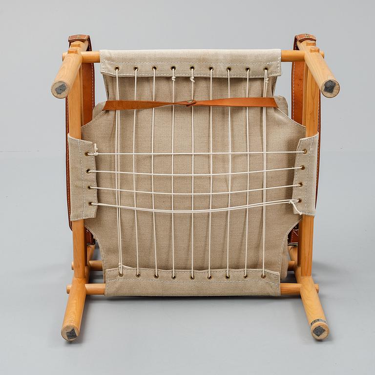 Arne Norell, a set of three "Sirocco" armchairs and two tables, Norell.