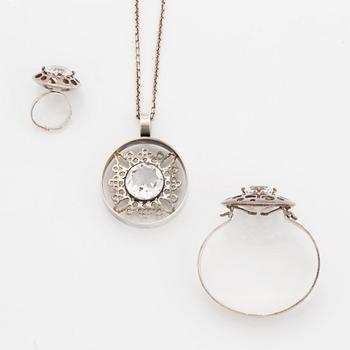 Bangle, ring and necklace, silver with colourless stones.