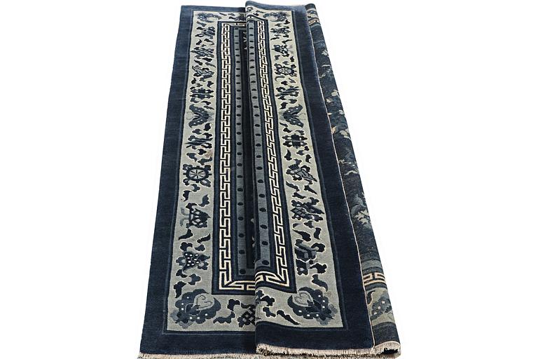 A carpet, China, Antique Finish, ca 250 x 152 cm.