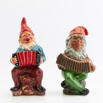 A collection of gnomes 12 pcs mid/late 20th century mostly painted terracotta.