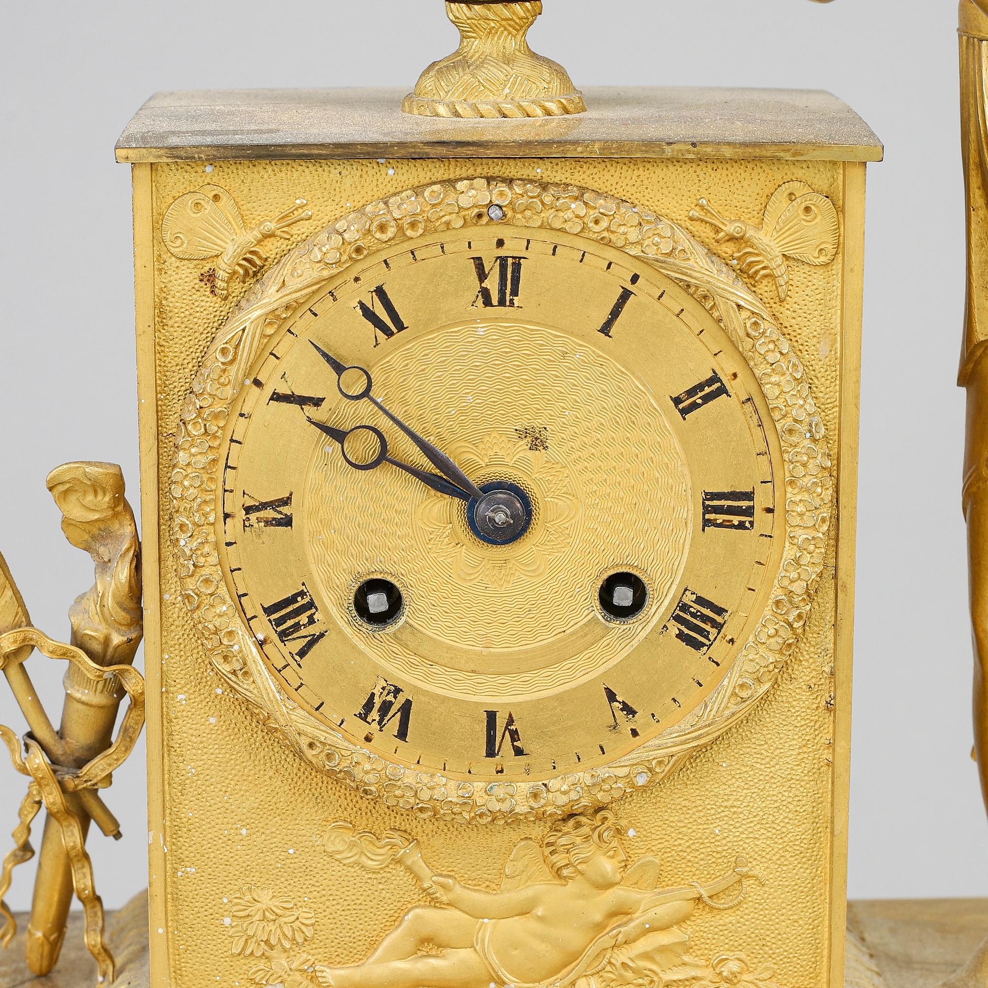 An Empire mantel clock, beginning of the 19th ct.