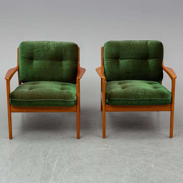 A pair of 'USA 75' easy chairs by Folke Ohlsson, Dux.